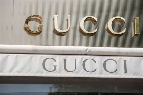 gucci owned by